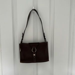 Brown leather Dooney and Bourke shoulder bag.
